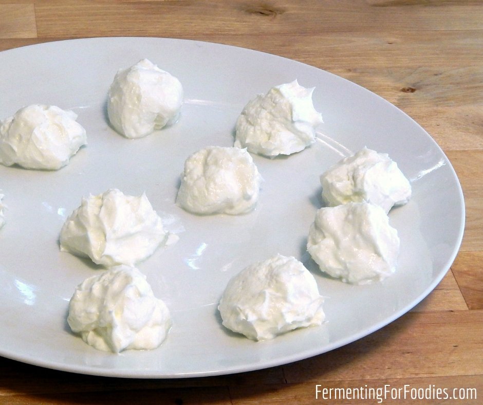 Herb marinated soft cheese with kefir cheese or traditional yogurt cheese