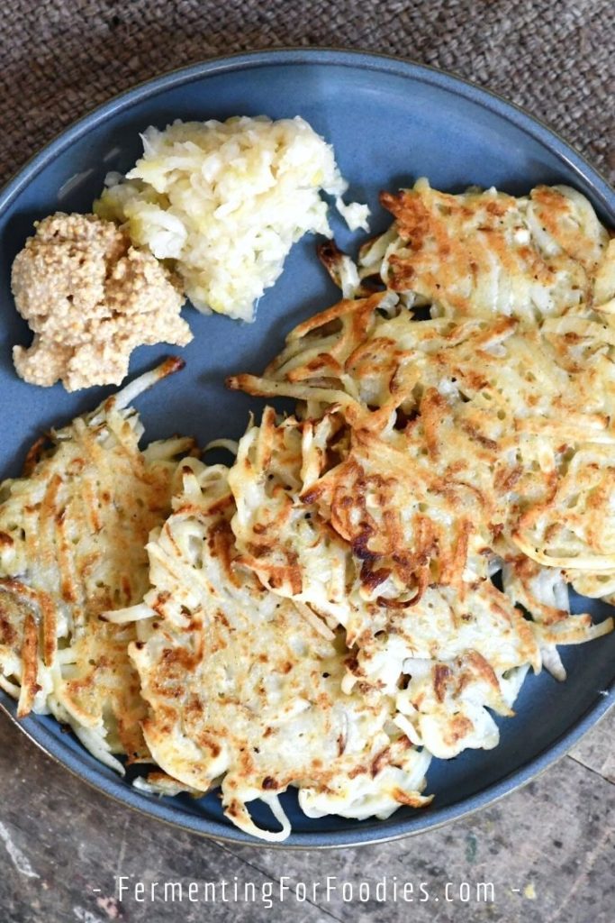 Sauerkraut latkes are not only flavorful, the sauekraut prevents the potatoes from browning.