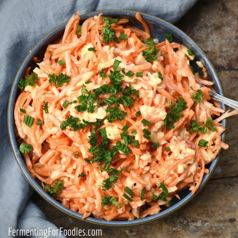 Carrot apple salad has a yogurt and horseradish dressing for a tangy and probiotic twist.