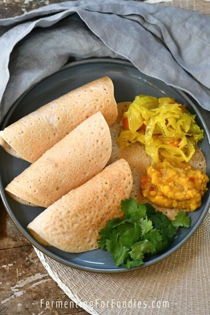 Gluten-free rice dosa with serving options