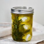 Marinated cheese in herbs and olive oil