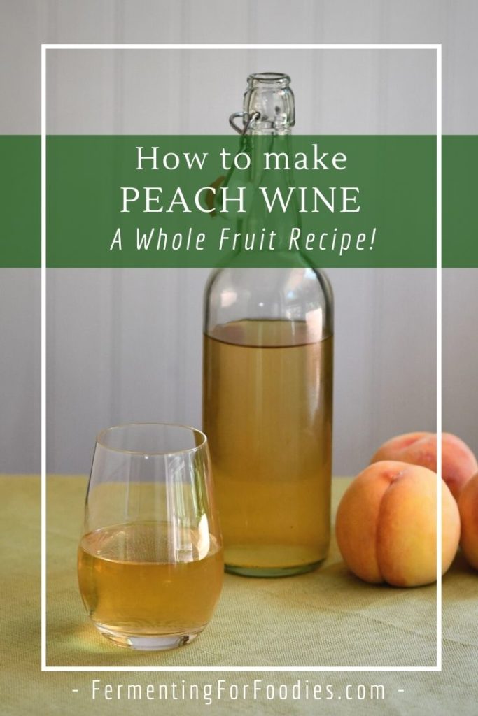 Homemade peach wine with whole fruit